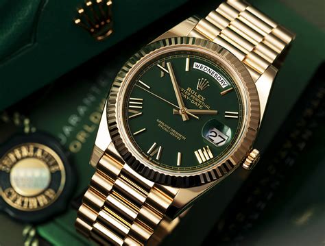 rolex ref 228238|Rolex green dial day date.